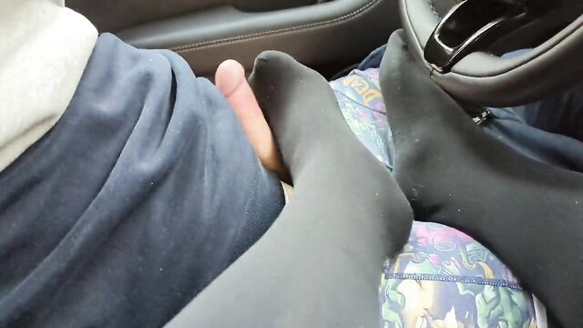 Car footjob in black pantyhose milks cock quickly