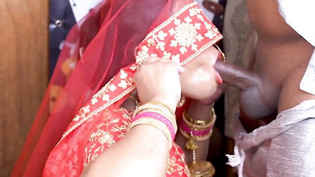 Desi bride in red saree sucks thick black cock at wedding