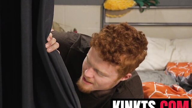 Redhead man peeking through curtain in Aspen Brooks trans ass training vid