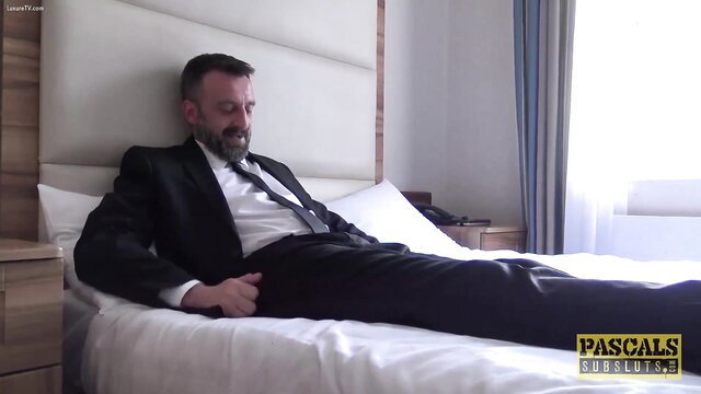 Pascals Subsluts master in suit relaxes on bed before fucking curvy sub slut