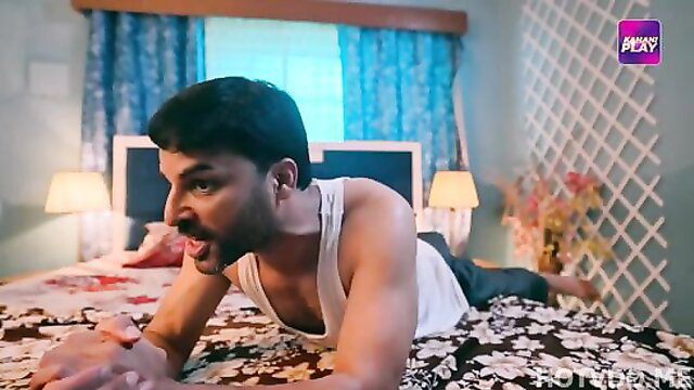 Hot Indian man in tank top lying on bed in Garbhadaan Episode 2