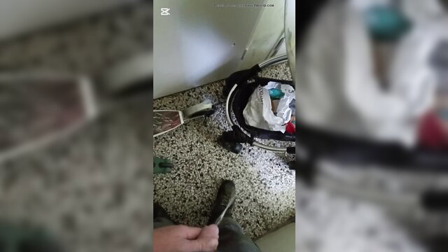 Amateur woman pissing on staircase floor in public