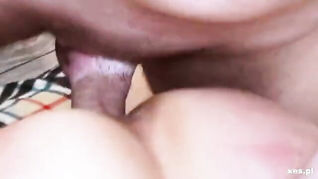 Closeup of young guy's uncut cock entering mature black woman's pussy