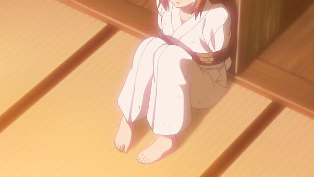 Redhead anime girl in white gi bound and kneeling barefoot on tatami