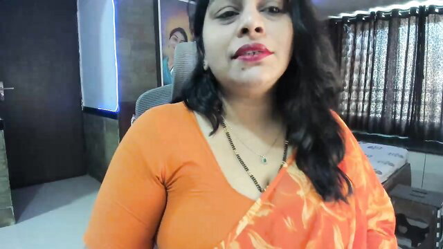 Tarivishu23 curvy Indian MILF in orange saree blouse, teasing topless striptease