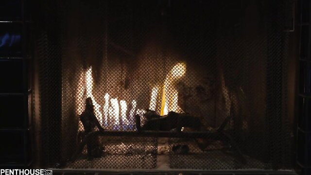 Layla Sin's fiery brunette passion in hot fireplace glow