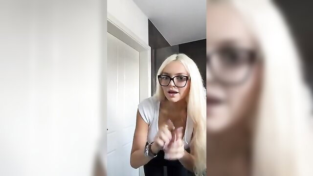 Busty German teen in glasses teases with deep cleavage closeup