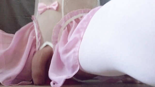 Cute femboy in pink frilly lingerie stretches ass with massive dildo