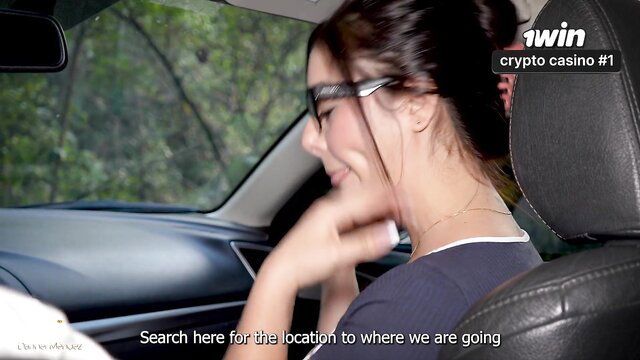 Iris in car smiling with glasses, TW1N crypto casino promo