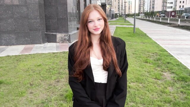Lizzy Wild redhead in blazer and top outdoors, sexy street pickup