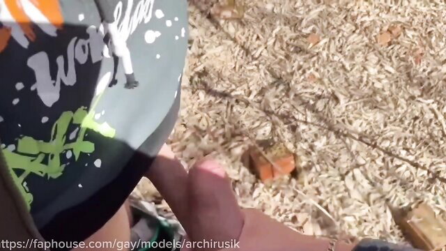 Femboy construction worker's smooth feet and ass in skimpy shorts outdoors