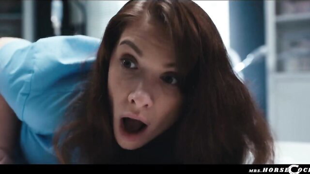 Josephine Jackson in nurse outfit, shocked O face closeup