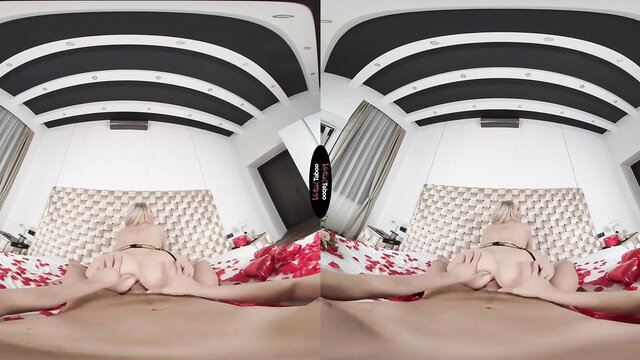 Blonde babe spreads legs wide on bed, ready for deep penetration