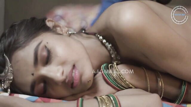 Nude Indian beauty sleeping topless in gold jewelry bangles necklace