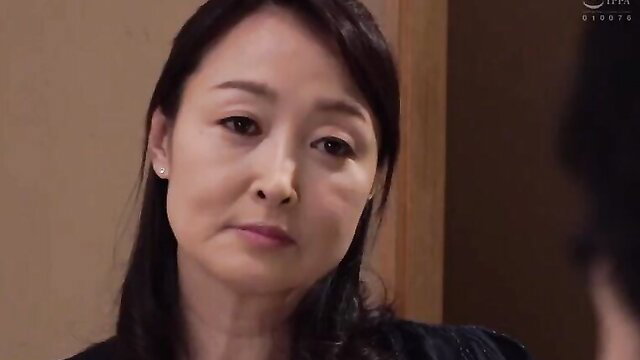 Japanese aunt caught masturbating in bath by nephew, closeup face