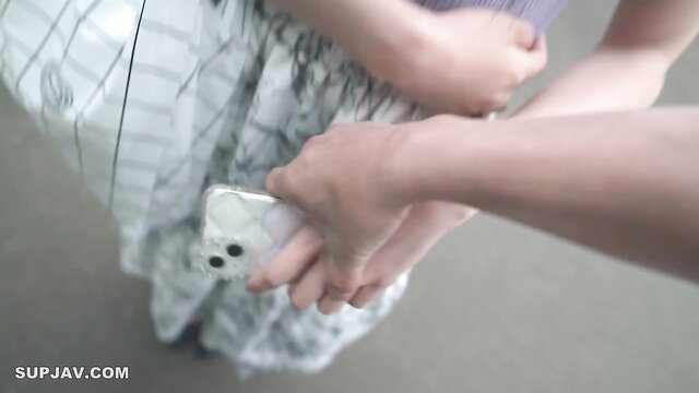 Amateur Asian woman in skirt groped by hands holding phone FC2PPV