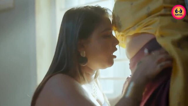 Indian couple intense kissing embrace in saree, steamy closeup