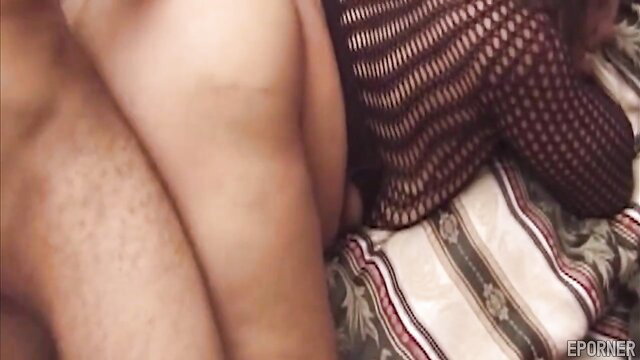 Black BBW amateur with huge bubble ass in fishnet lingerie on bed