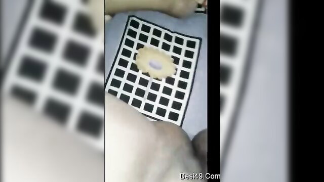 Desi school teacher yellow lingerie on checkered bedspread closeup