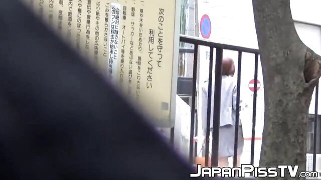 Pervy cameraman films two Asian women pissing behind car, Piss Japan TV