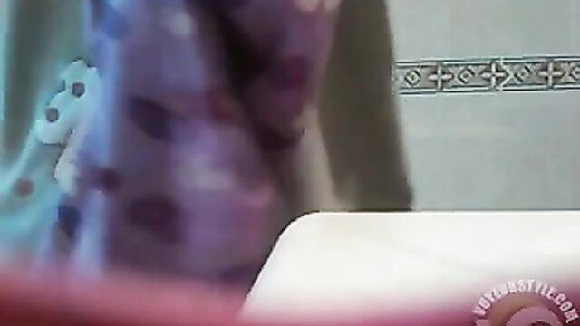 Camgirl closeup sucking soaked purple panties in steamy bathroom