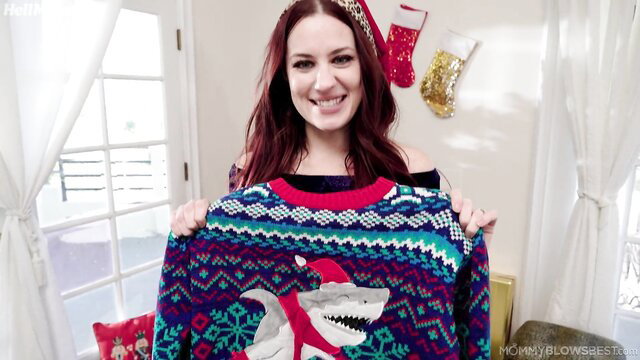 Redhead MILF Jessica Ryan holds sexy shark Christmas sweater