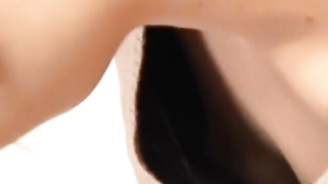 Close-up down sweater view of woman's perky nipples peeking out