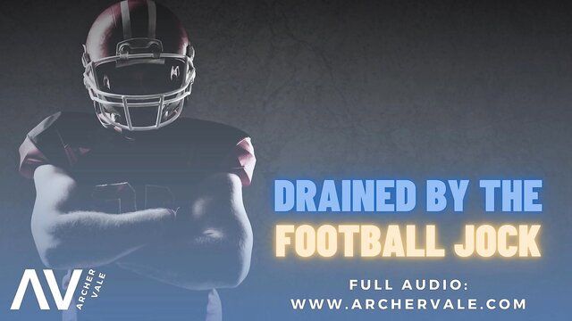 Muscular football jock in helmet and uniform ready to dominate