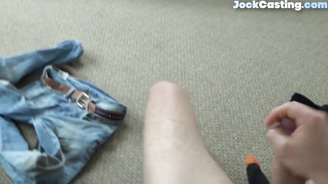 Jock audition solo: muscular guy strokes thick cock with marker on leg