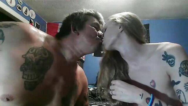 Snowmexican100 tattooed couple kissing passionately in bed
