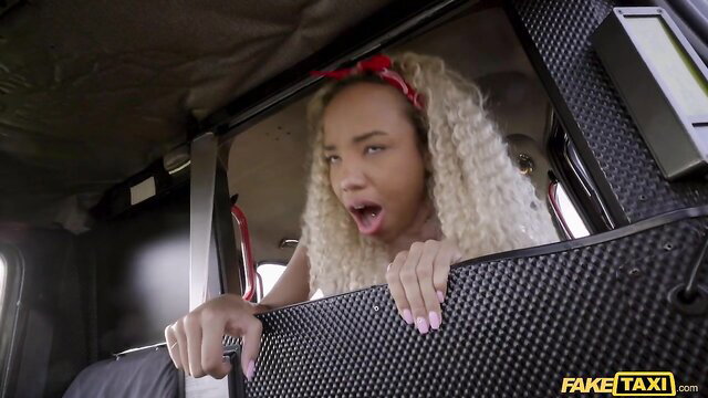 Romy Indy blonde curly haired beauty leaning out Fake Taxi window