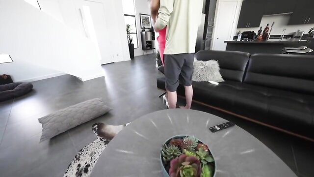 Sandra Otterson sexy MILF standing in shorts, hot legs view