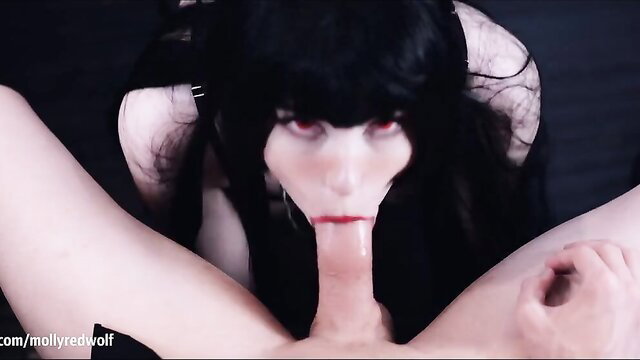 Gothic cosplay babe with black bangs gives deepthroat blowjob closeup