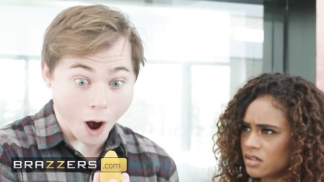 Scarlit Scandal shocked by huge banana as young guy in plaid shirt