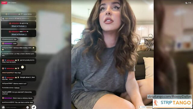 RoxxyDallas hot brunette streamer in gray dress on StripTango live