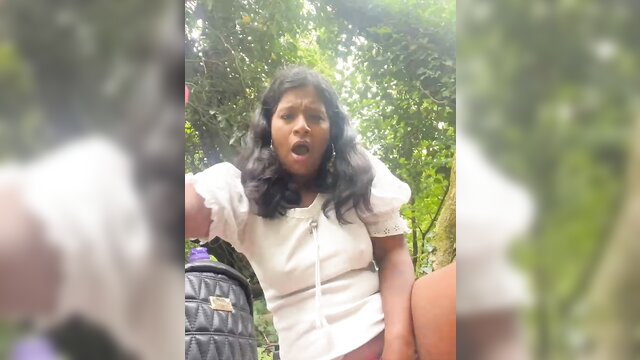 RoseMelanie in white blouse, surprised face, lush outdoor flashing tease