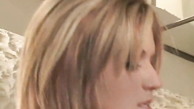 Blonde babe closeup profile in steamy bathroom scene