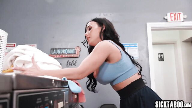Jennifer White bending over laundromat washer in tight top and skirt