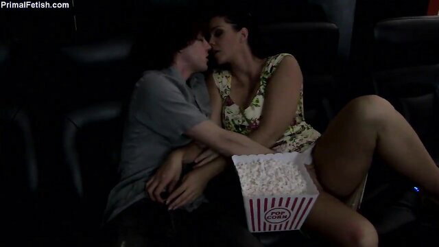 Alison Tyler makes out with guy at movies, popcorn on lap