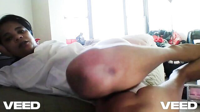 Minah Khali nurse cosplay in white scrubs, thick thighs bruised knee erotic pose