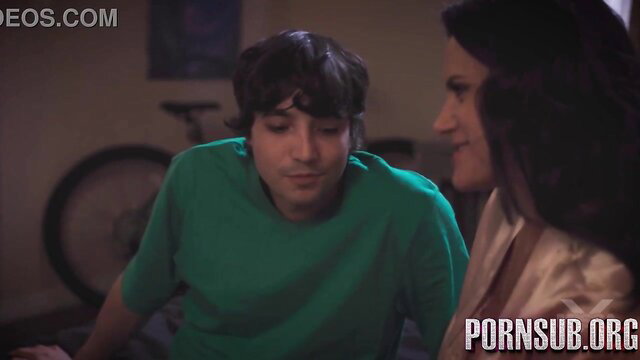 Brunette stepmom dances seductively with young guy in green shirt