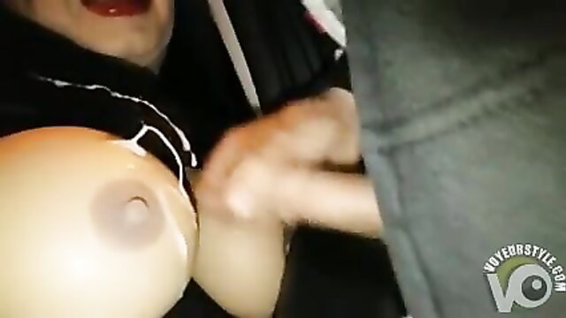 Swinger woman with large boobs covered in sticky jizz closeup