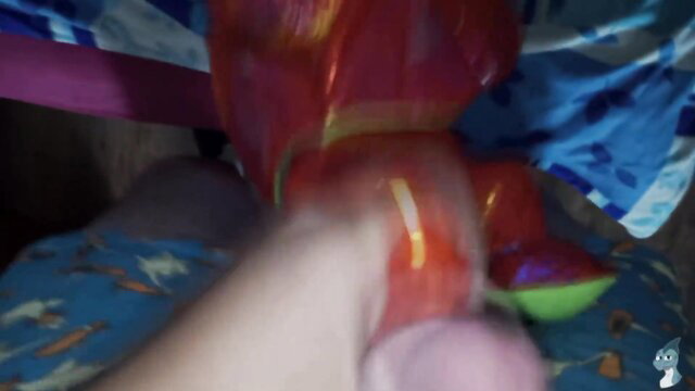 POV handjob with red dragon costume model rubbing cock on green toy