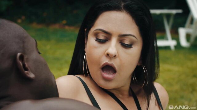 Mariska X deepthroating big black cock outdoors