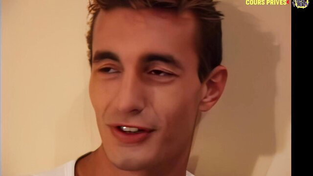 Handsome twink with spiky hair smirking in gay hardcore thumbnail