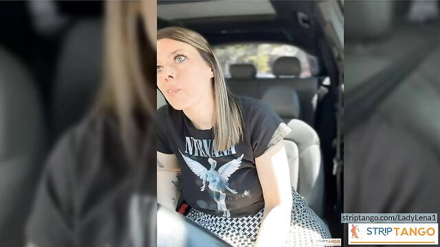LadyLena1 in car wearing Nirvana tee, ready to masturbate