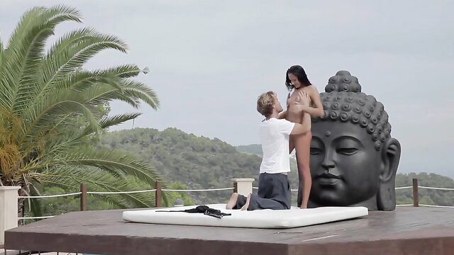 July Saint nude by Buddha statue in Celestine Lucullus cosplay