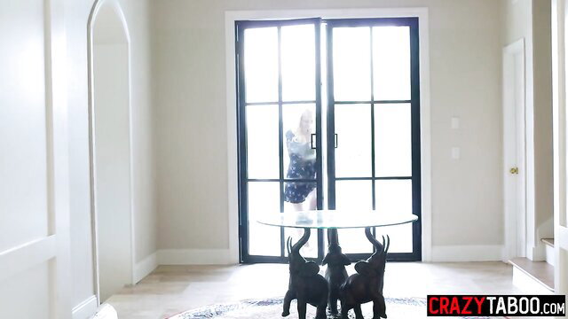 Alison Rey in black dress at door, hot MILF tease