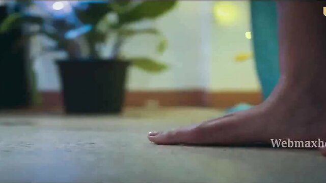 Closeup of sexy Indian woman's bare foot and toes in Ullu series Chidiya Part 02