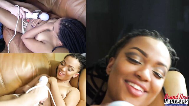 Hot black amateur Naomi masturbates with vibrator on couch